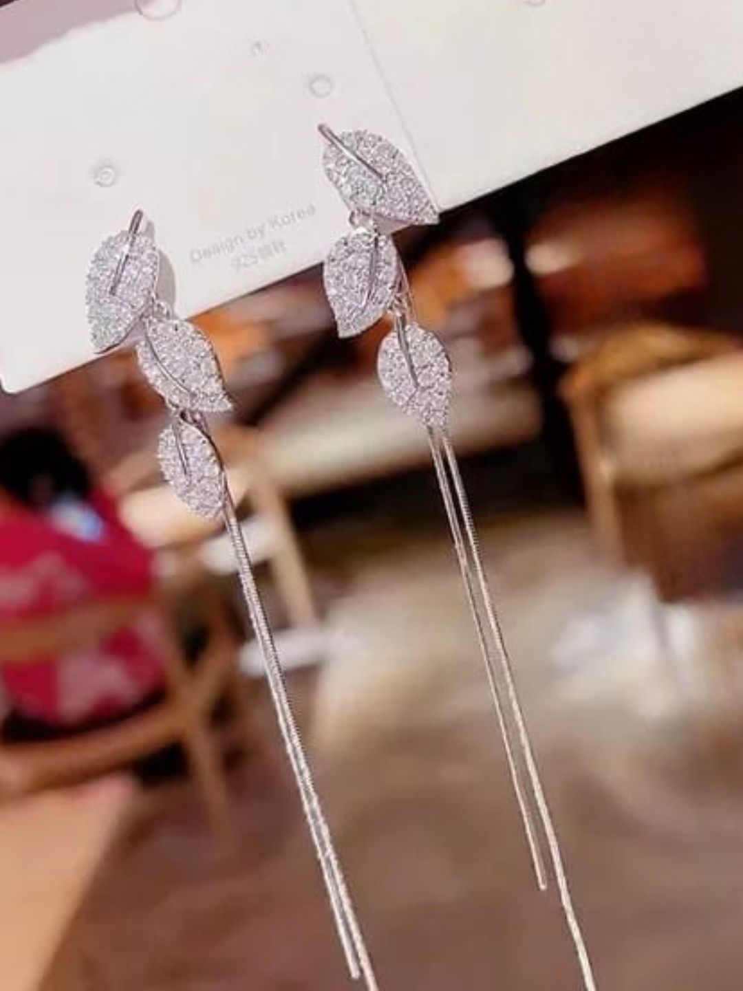 BLINGY SILVER LEAFY EARRINGS