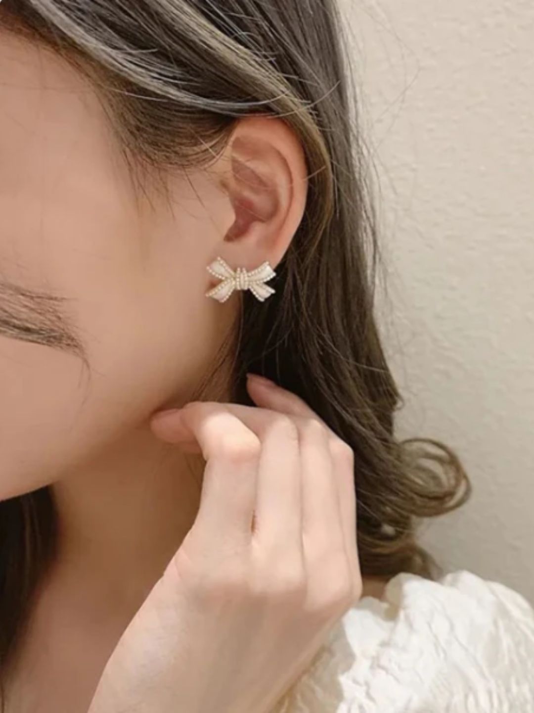 WHITE BOW STUD EARRINGS